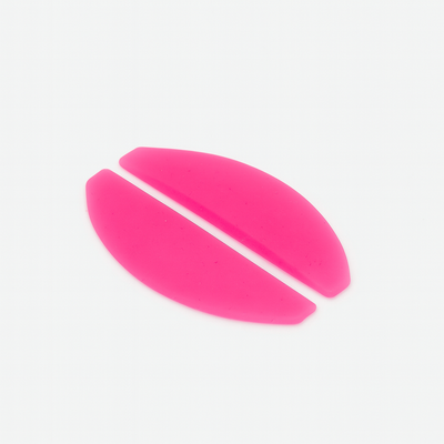 Two pink oval objects on a white background